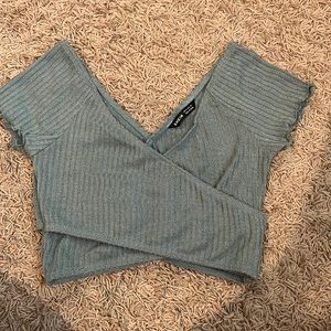 green cropped cross shirt